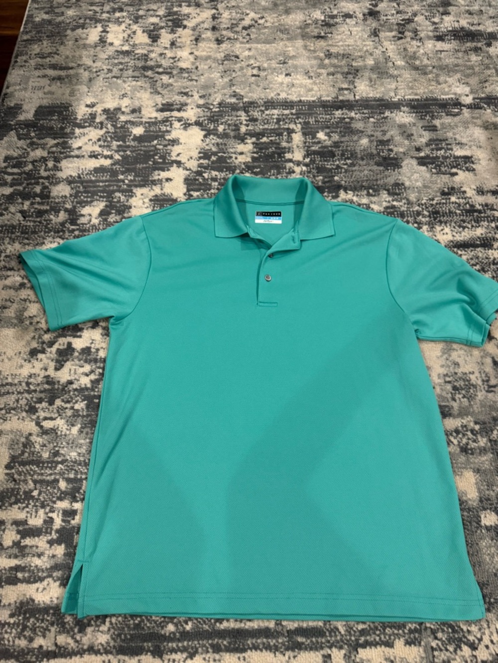 Men’s PGA TOUR polo shirt 

Worn a few times
Size: M